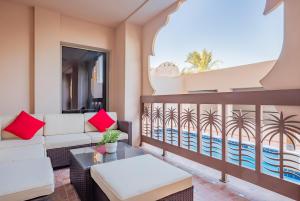 a living room with a view of the pool at Exclusive Escapes Private Pool Homes and Villas by GLOBALSTAY Holiday Homes in Dubai