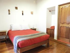 Voodi või voodid majutusasutuse Picaflor Tambo Guest House toas