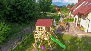 Detský kútik v ubytovaní Luksusowe domy na Mazurach nad jeziorem 2