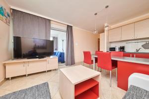 Kuchyň nebo kuchyňský kout v ubytování Apartment Vita Moela 23 & 24
