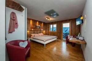 Postel nebo postele na pokoji v ubytování Hotel Slalom