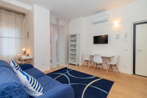 Гостиная зона в JOIVY Cosy 1bed flat in Fiera, Milan