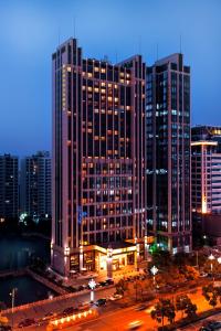 Imagem da galeria de Wealthy All Suite Hotel Suzhou em Suzhou