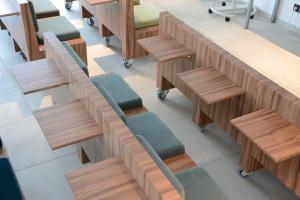 an overhead view of a classroom with wooden desks and benches at Live Hotels Bordeaux Lac in Bordeaux +37 photos