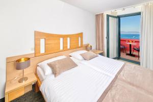 Postel nebo postele na pokoji v ubytování Veya Maradiso Hotel by Aminess