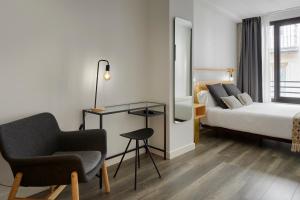 Postel nebo postele na pokoji v ubytování Hostal Arriazu