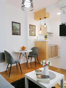 Kuchyň nebo kuchyňský kout v ubytování Apartman Mia