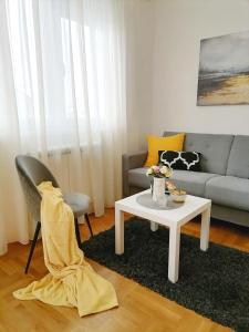 Predel za sedenje v nastanitvi Apartman Mia