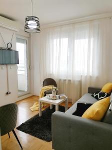 Predel za sedenje v nastanitvi Apartman Mia