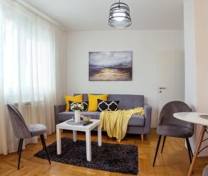 Predel za sedenje v nastanitvi Apartman Mia