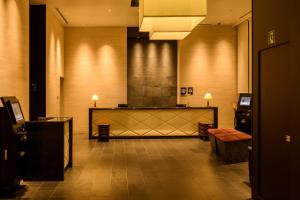 TV a/nebo společenská místnost v ubytování Tokyu Stay Ginza