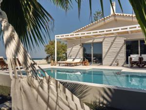 Fotografie z fotogalerie ubytování Astarte Villas - Onda Del Mar Beach Villa v destinaci Argasi