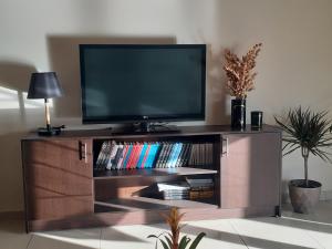 TV a/nebo společenská místnost v ubytování House escape