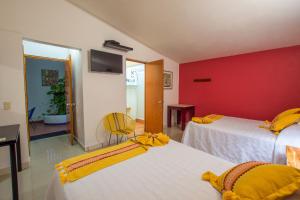 Voodi või voodid majutusasutuse Hotel Meson de Mita toas