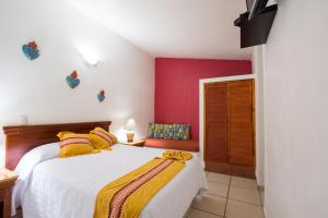 Voodi või voodid majutusasutuse Hotel Meson de Mita toas