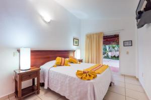 Voodi või voodid majutusasutuse Hotel Meson de Mita toas