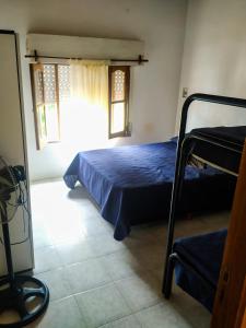 Katil atau katil-katil dalam bilik di Residencial Julia