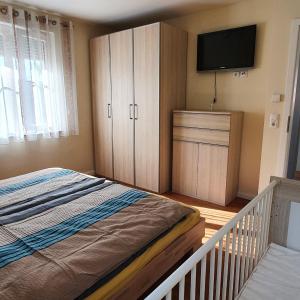 Postel nebo postele na pokoji v ubytování Reethaus-Carpe-Diem