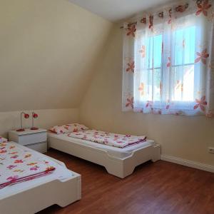 Postel nebo postele na pokoji v ubytování Reethaus-Carpe-Diem