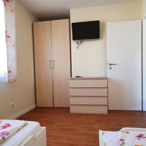 Postel nebo postele na pokoji v ubytování Reethaus-Carpe-Diem