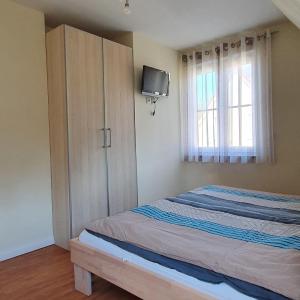 Postel nebo postele na pokoji v ubytování Reethaus-Carpe-Diem