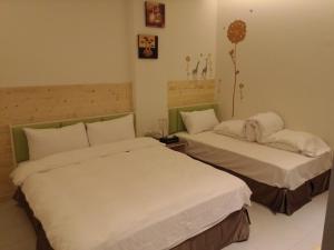 Postel nebo postele na pokoji v ubytování Tilon Hotel