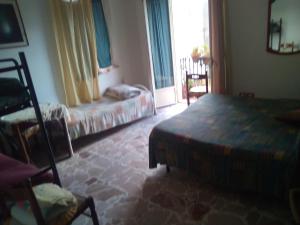 A bed or beds in a room at Room in Guest room - Room with Etna view