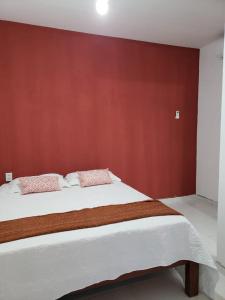 Giường trong phòng chung tại Casa no Barro Preto - Vila da Praia, Iguape - Ceará