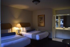 Voodi või voodid majutusasutuse Hotel Frontiere Tijuana toas