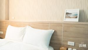 Postel nebo postele na pokoji v ubytování 金門微醺民宿 Kinmen TipsyHotel B&B