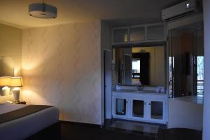 Voodi või voodid majutusasutuse Hotel Frontiere Tijuana toas