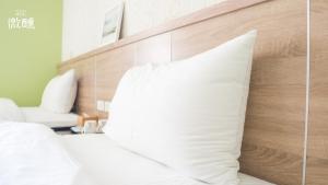 Postel nebo postele na pokoji v ubytování 金門微醺民宿 Kinmen TipsyHotel B&B