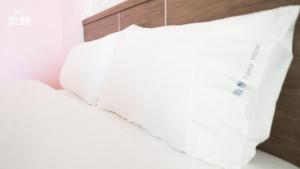 Postel nebo postele na pokoji v ubytování 金門微醺民宿 Kinmen TipsyHotel B&B
