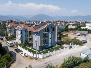 an aerial view of a building in a city at F48 Aparts in Fethiye