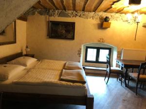 Letto o letti in una camera di Burg Plankenstein