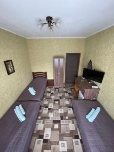Posteľ alebo postele v izbe v ubytovaní Отель "Natali"