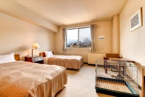 Katil atau katil-katil dalam bilik di Hotel La Montagne Furuhata +76 gambar