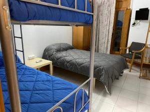 
A bunk bed or bunk beds in a room at Albergue las Veletas
