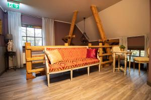 Двухъярусная кровать или двухъярусные кровати в номере Viesu nams Donas