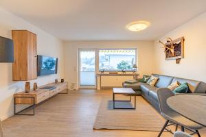 Televiisor ja/või meelelahutuskeskus majutusasutuses Bergzauber