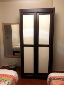 A bed or beds in a room at Amazing view apartment in Golf Porto Marina with marina access