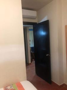A bed or beds in a room at Amazing view apartment in Golf Porto Marina with marina access