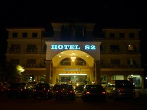 a parking lot in front of a hotel at night at S2 Hotel in Seremban +25 photos
