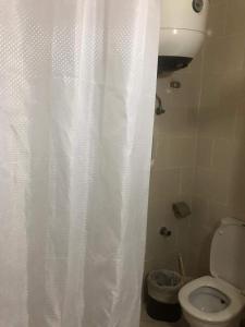 A bathroom at Amazing view apartment in Golf Porto Marina with marina access