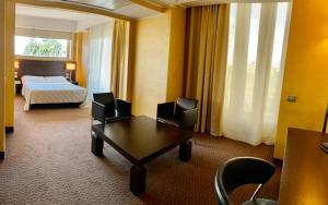Voodi või voodid majutusasutuse E' Hotel toas +34 fotot