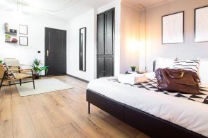 a bedroom with a bed with a purse on it at Regouro - an Hidden Gem in Douro Valley in Boassas