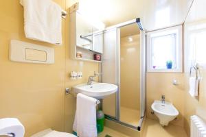 Koupelna v ubytování Appartamenti Residence La Roggia