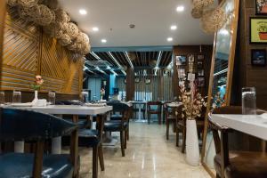 Un restaurant sau alt loc unde se poate mânca la The Avenue Hotel Ballygunge