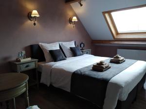 Postel nebo postele na pokoji v ubytování 't Hooghe Licht Bed & Breakfast