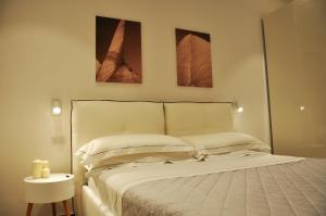 Posteľ alebo postele v izbe v ubytovaní Luxury 2 Apartments Cervia with Swimming Pool